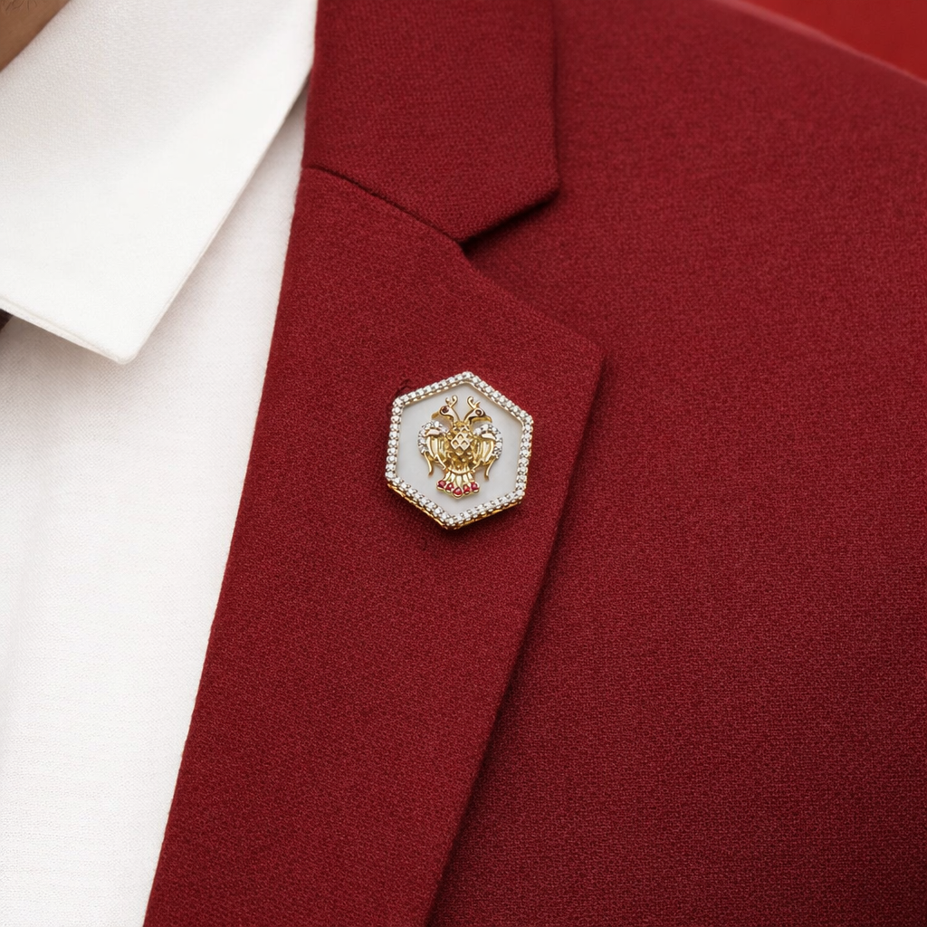 Gold lapel pin with diamond border and mother of pearl design for men