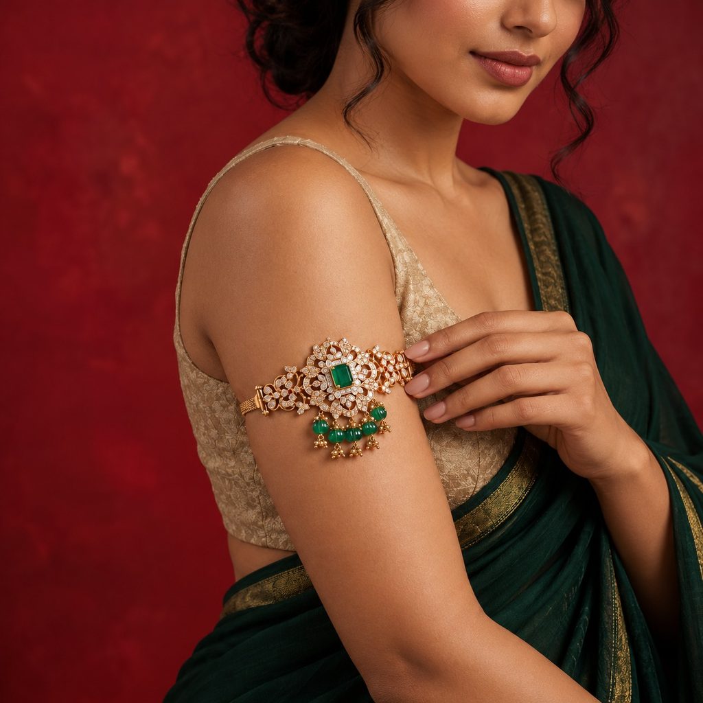 C. Krishniah Chetty floral armlet with green gemstones styled above the elbow
